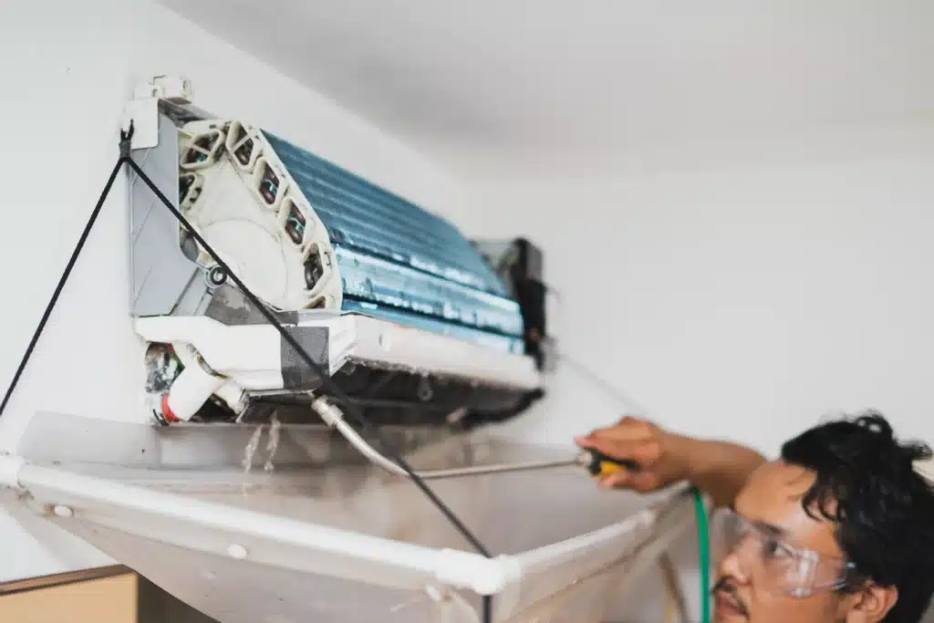 air conditioner cleaning by technician indoors 2026 01 08 07 41 18 utc