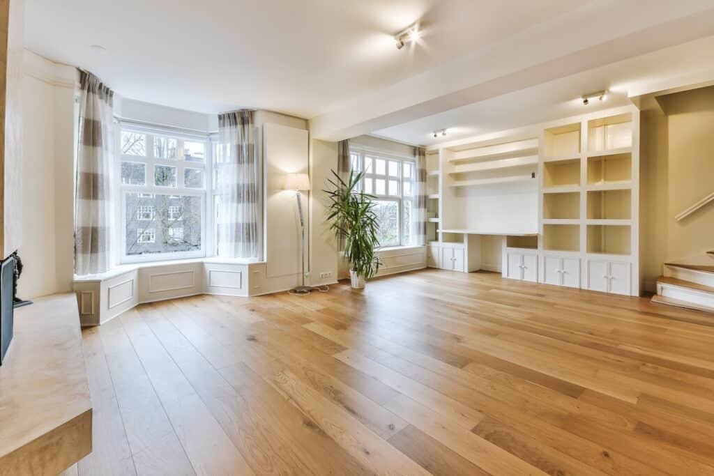 a cozy and spacious room in a luxury house