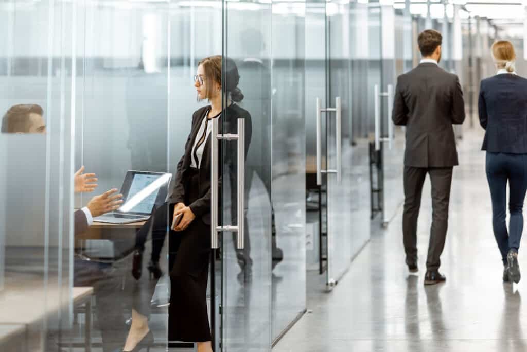 business people in the hallway of the modern offic 2026 01 08 07 52 23 utc