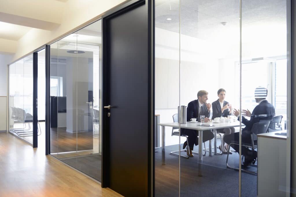 business professionals conferring in modern office 2026 01 11 09 47 07 utc