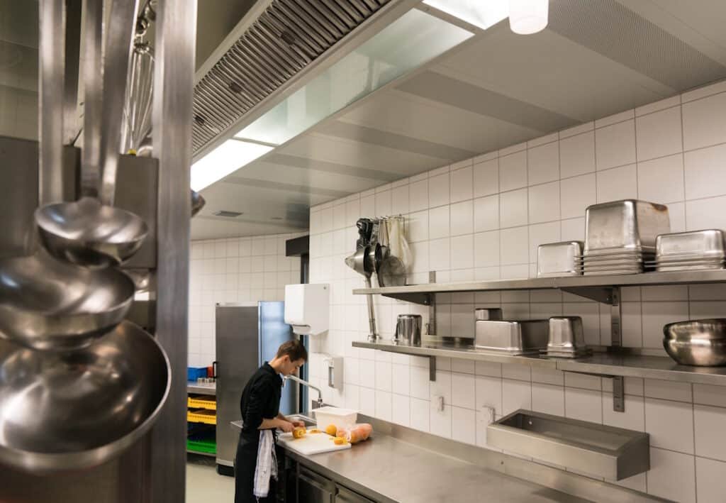 chef preparing ingredients in a commercial kitchen 2026 03 26 09 52 57 utc