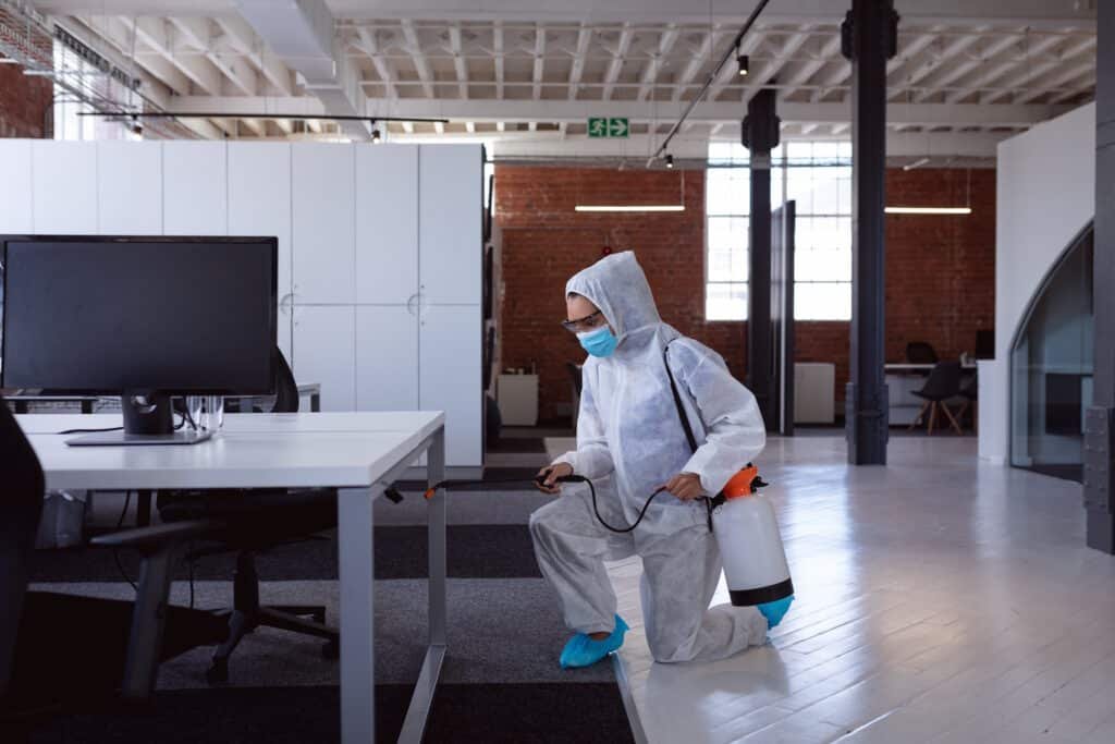 cleaner wearing ppe suit glasses and mask disinfe 2026 01 09 08 36 55 utc