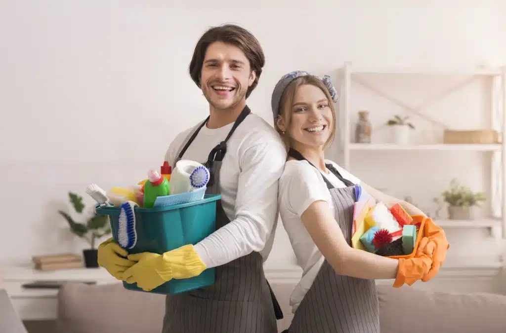 cleaning team smiling and holding cleaning supplie 2026 01 08 23 16 01 utc