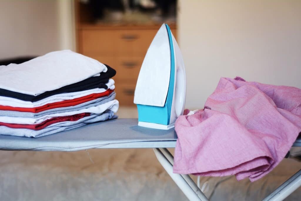 close up view of iron clothes on ironing board wit 2026 01 11 09 57 46 utc
