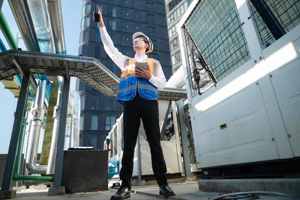 construction supervisor with tablet and radio on r 2026 01 07 00 24 05 utc