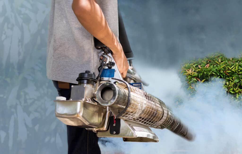 man fogging plants with mosquito control sprayer 2026 03 26 07 41 37 utc