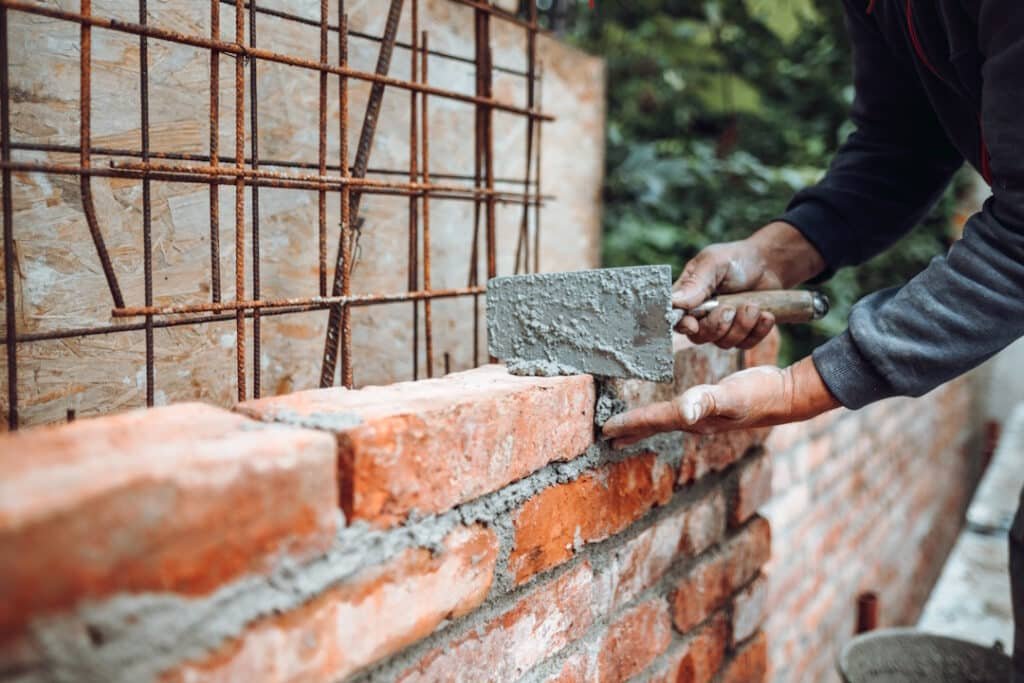 professional worker using pan knife for building b 2026 01 05 01 03 05 utc