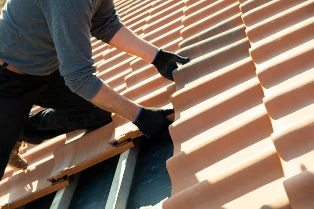 roofer installing roofing tiles for new home const 2026 03 16 02 10 22 utc