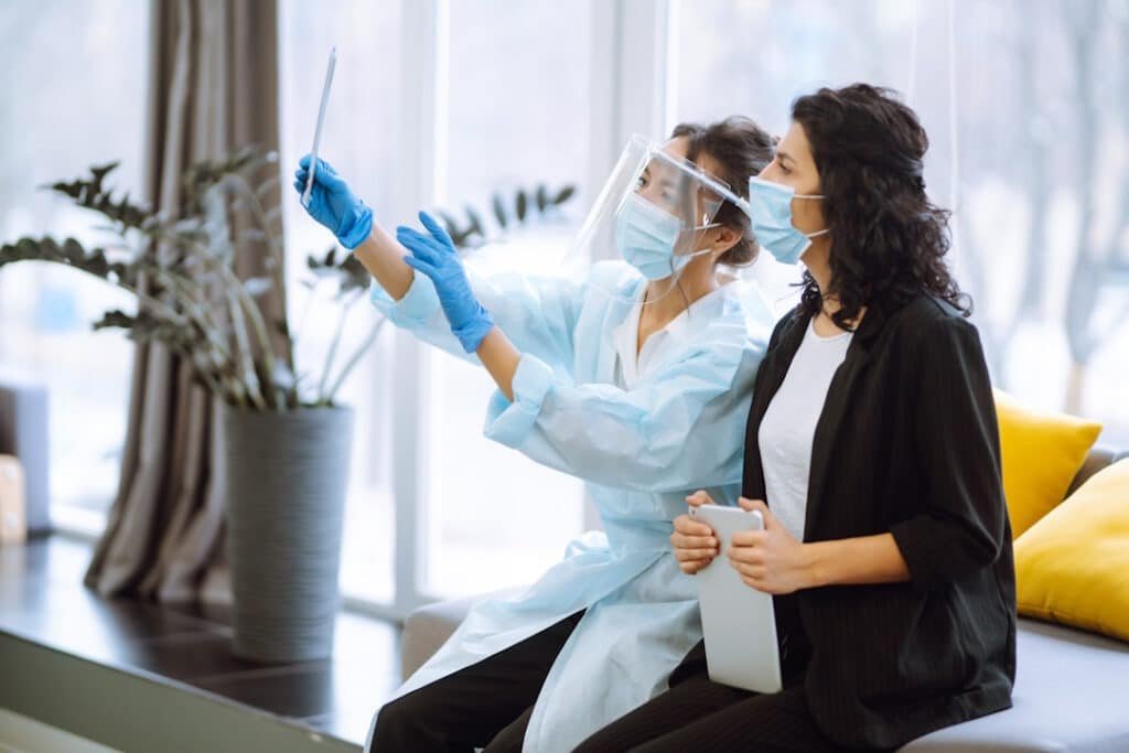 woman and doctor reviewing x ray in office 2026 03 19 10 42 43 utc
